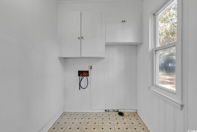 laundry room featuring cabinets and washer hookup