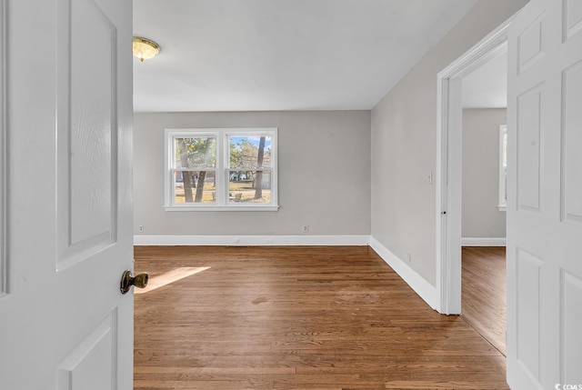 spare room featuring hardwood / wood-style flooring