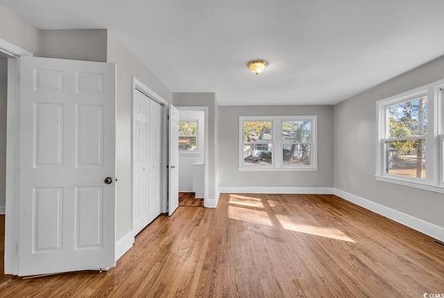 unfurnished bedroom featuring light hardwood / wood-style flooring