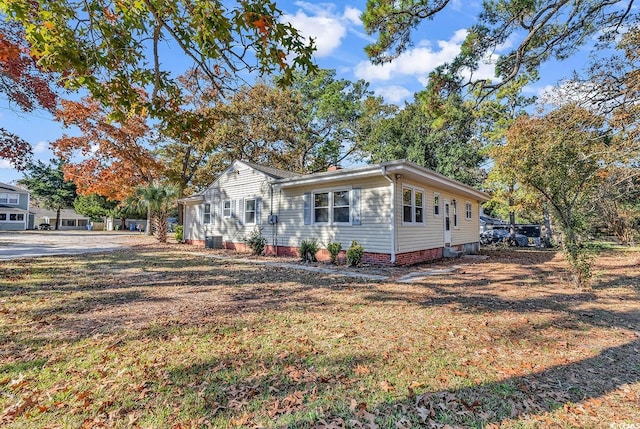 ranch-style home with central AC