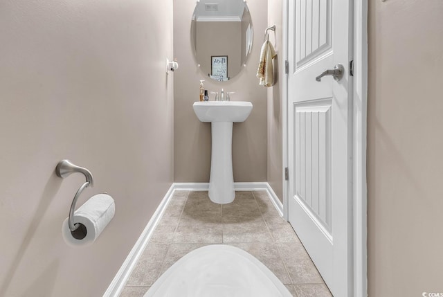 bathroom featuring tile patterned flooring