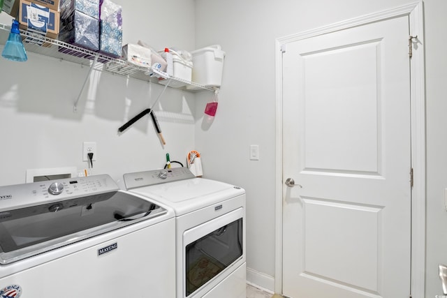 laundry area featuring independent washer and dryer