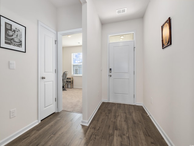 hallway with dark wood-type flooring