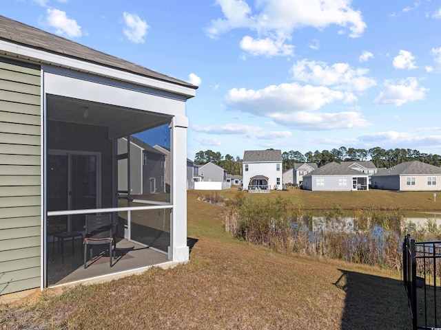 view of yard featuring a sunroom