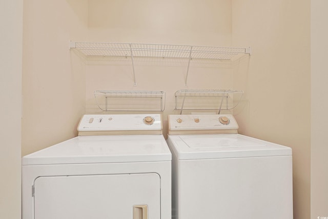 laundry area featuring separate washer and dryer