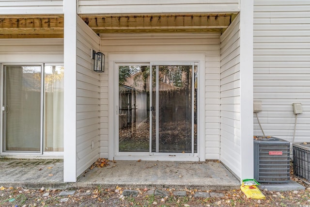 entrance to property featuring central AC