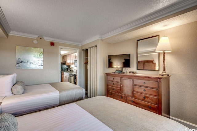 bedroom featuring crown molding and a textured ceiling