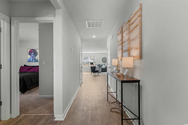 hallway featuring hardwood / wood-style floors