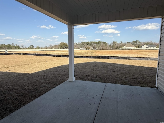 view of yard featuring a patio area and fence