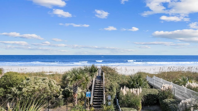 property view of water featuring a beach view