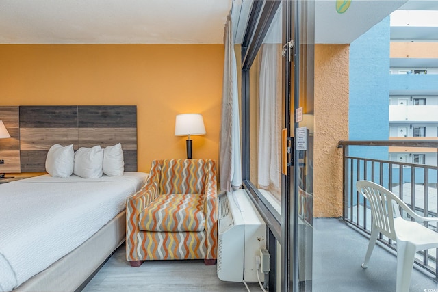 bedroom featuring hardwood / wood-style flooring