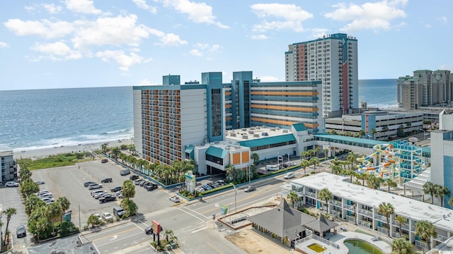 bird's eye view with a view of the beach and a water view