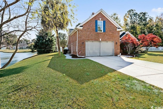 view of side of home with a garage, concrete driveway, brick siding, and a lawn