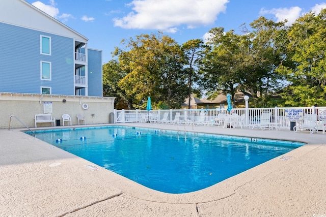 191 Maison Dr Unit B320, Myrtle Beach, SC 29572 - community pool with a patio area and fence