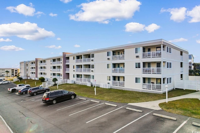 191 Maison Dr Unit B320, Myrtle Beach, SC 29572 - view of building exterior featuring uncovered parking