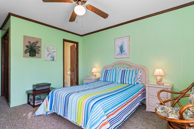 carpeted bedroom featuring ceiling fan, ornamental molding, and a textured ceiling