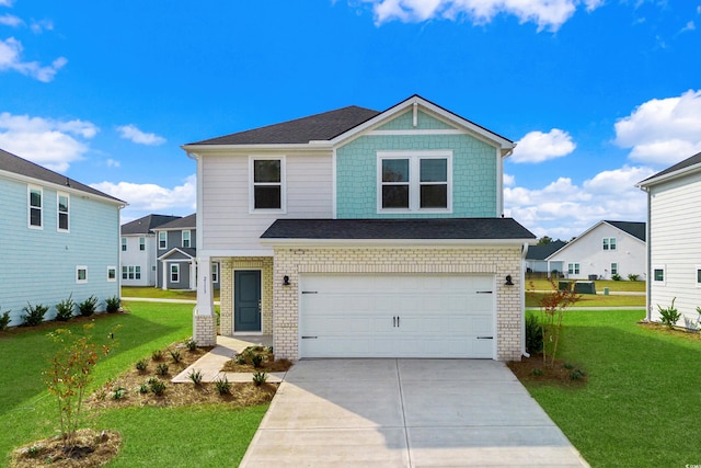 view of front of home with a garage and a front yard