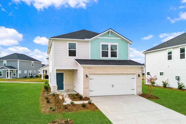 view of front of house with a garage and a front lawn