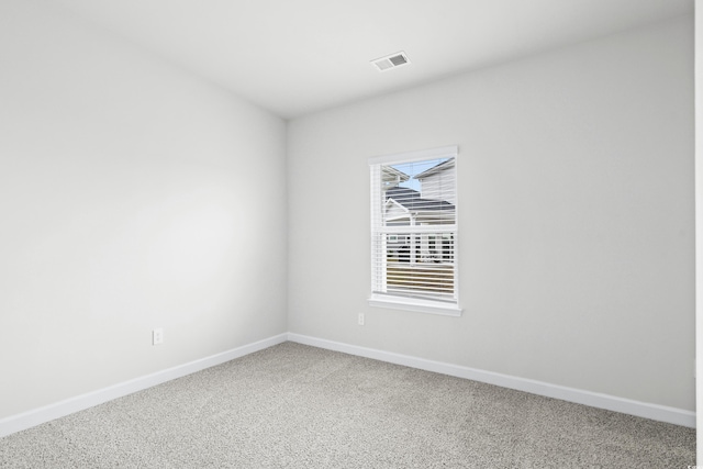 unfurnished room featuring carpet floors