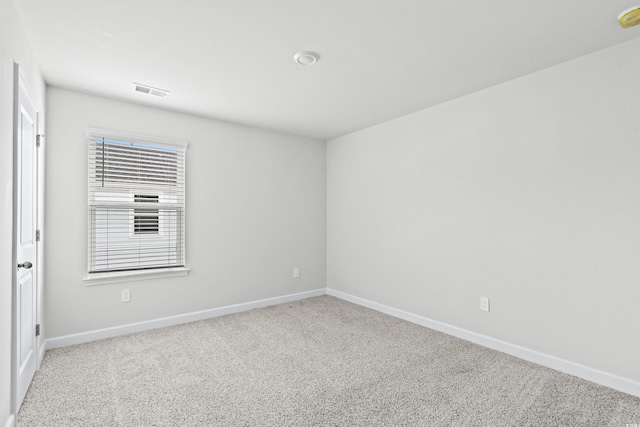 unfurnished room with carpet