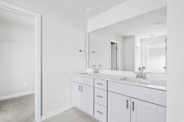 bathroom featuring vanity and tile patterned flooring