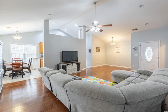 living area featuring recessed lighting, visible vents, ceiling fan, wood finished floors, and baseboards