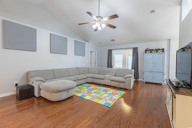 living area with baseboards, ceiling fan, high vaulted ceiling, and dark wood-style flooring