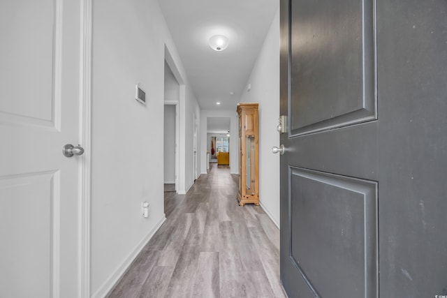 hall featuring light wood-type flooring