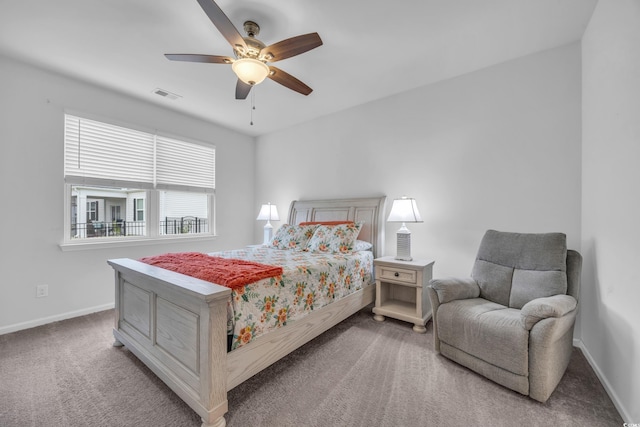 bedroom with ceiling fan and carpet floors