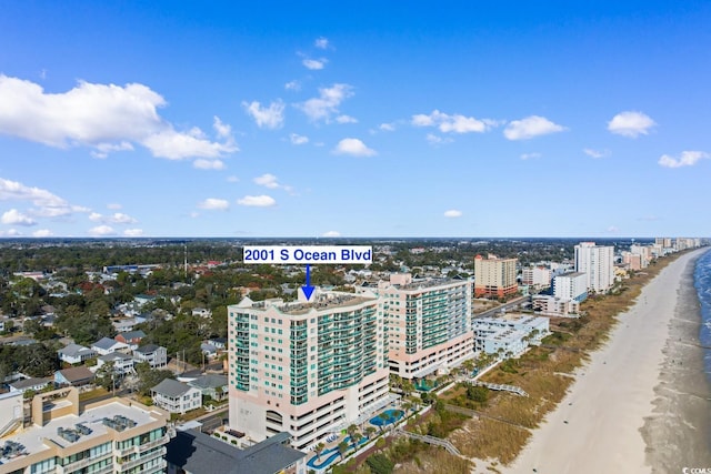 bird's eye view with a view of the beach and a water view