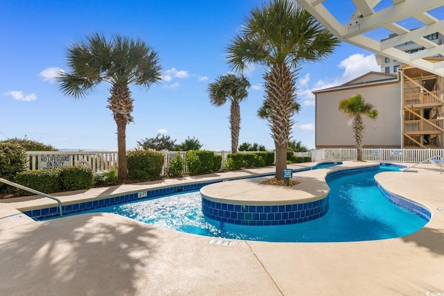 view of pool featuring a patio