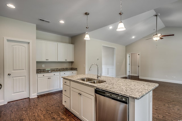 kitchen featuring stainless steel dishwasher, a kitchen island with sink, sink, and white cabinets