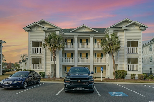 view of outdoor building at dusk