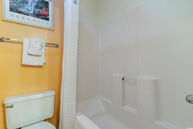 bathroom with toilet and walk in shower