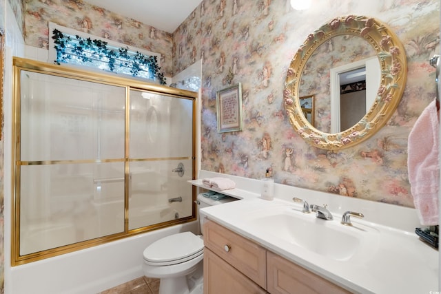 full bathroom with shower / bath combination with glass door, vanity, toilet, and tile patterned flooring