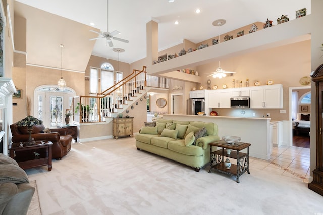 tiled living room with a high ceiling