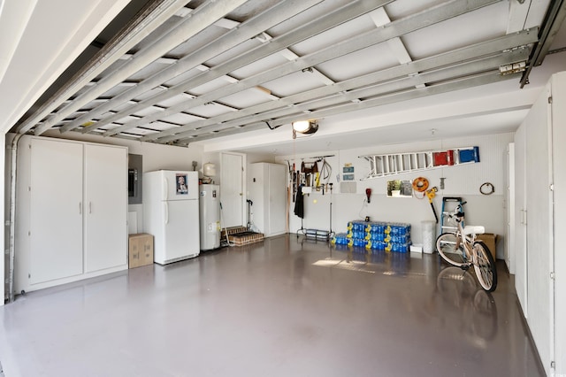 garage featuring water heater and white fridge