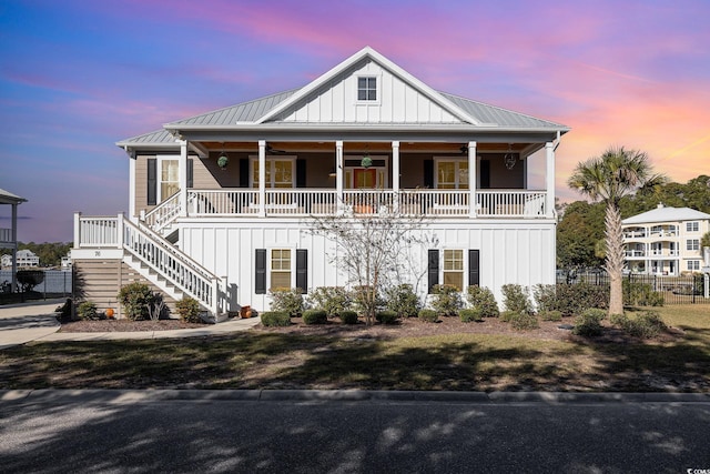 view of front of property with covered porch and ceiling fan