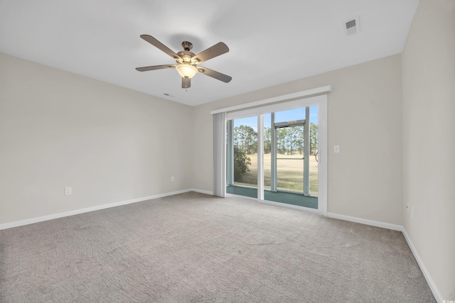 carpeted empty room with ceiling fan