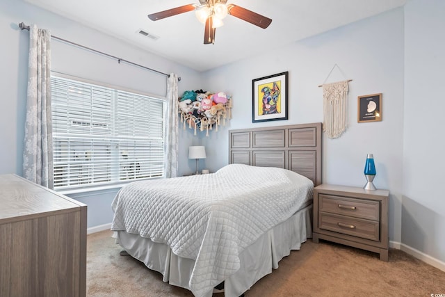 carpeted bedroom featuring ceiling fan