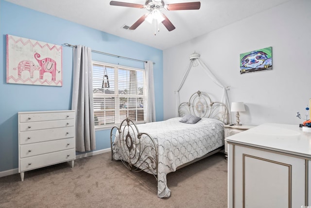 carpeted bedroom with ceiling fan