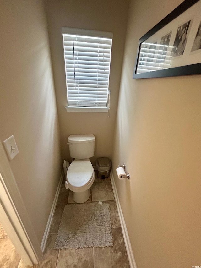 bathroom featuring toilet