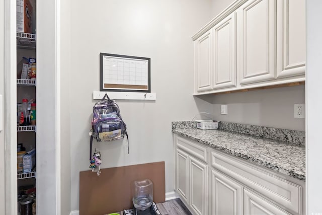 laundry room featuring hardwood / wood-style floors