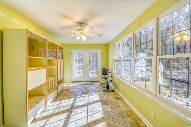 interior space featuring ceiling fan, a healthy amount of sunlight, and french doors