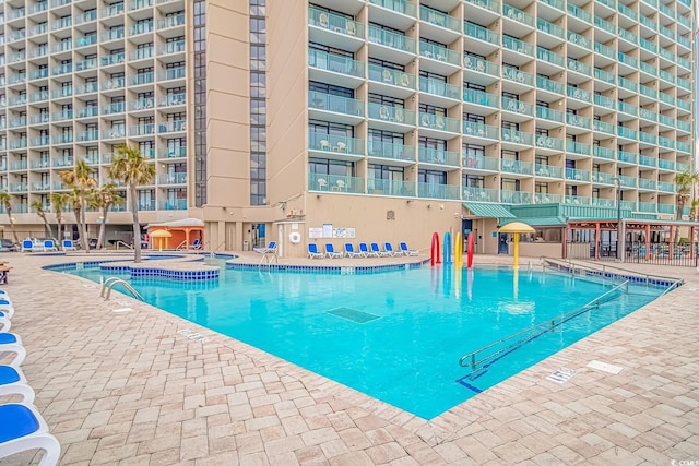 pool with a patio