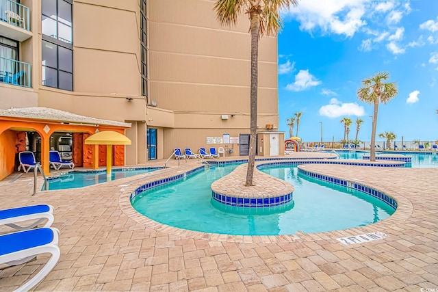 pool featuring a patio