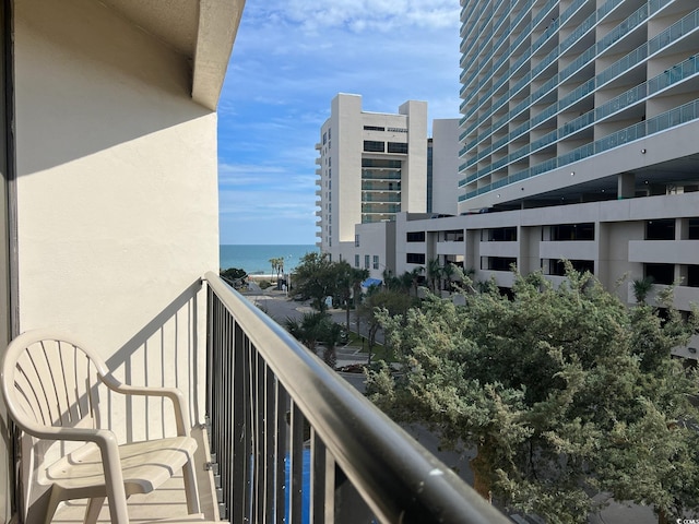 balcony featuring a water view