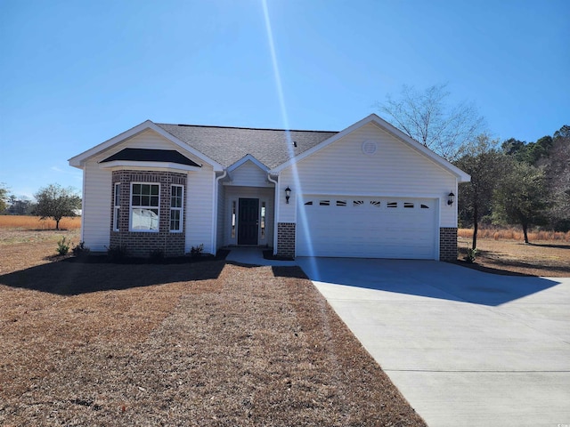 ranch-style house featuring a garage