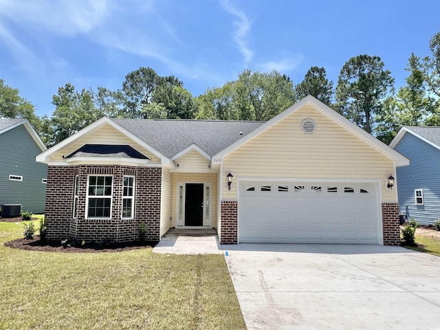 ranch-style home with central AC, a front lawn, and a garage