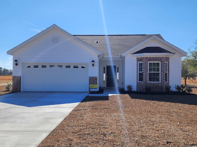 single story home with a garage